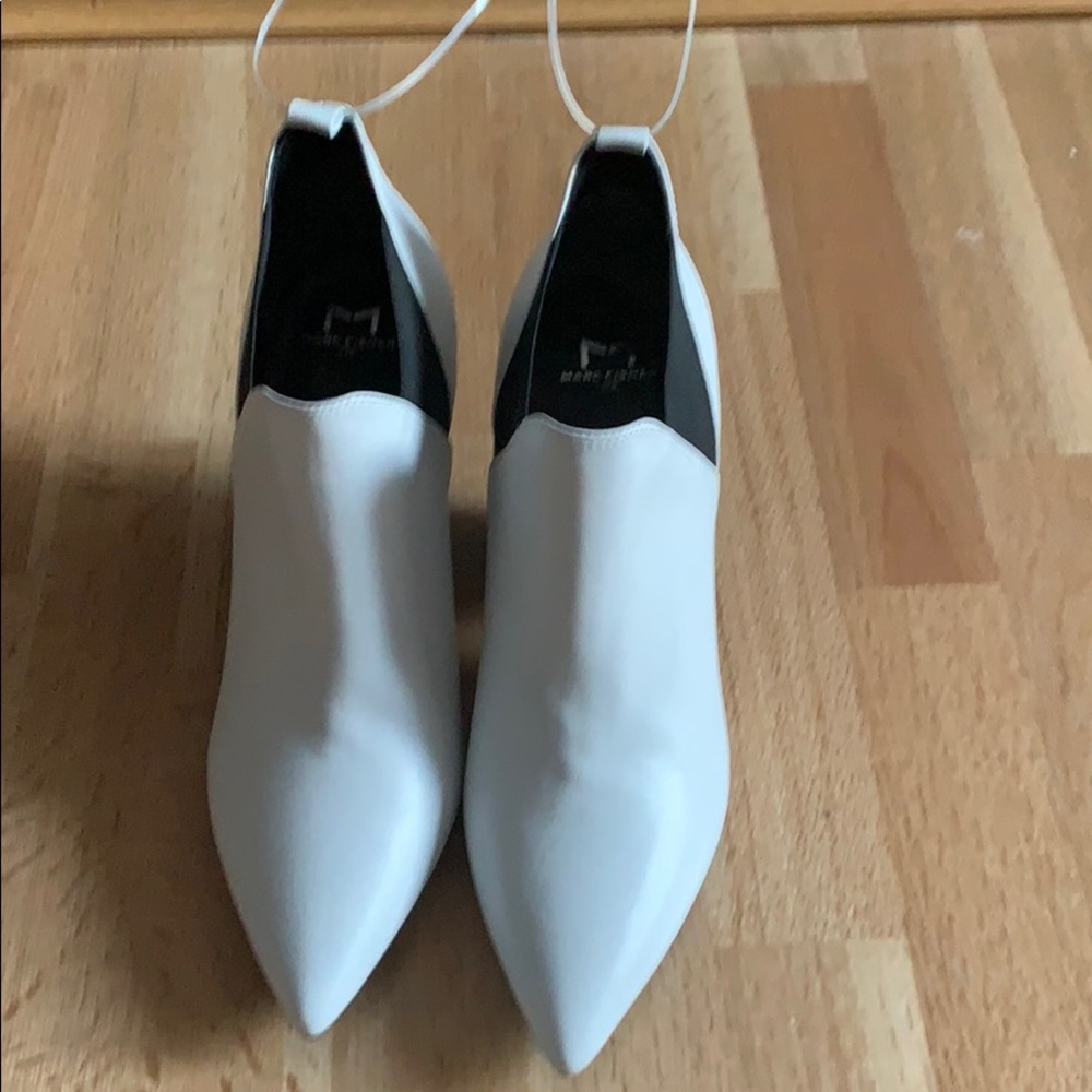 White leather ankle boots by Marc Fisher